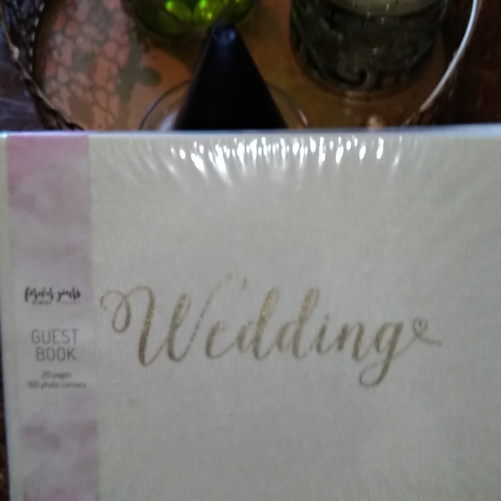 Brand new never opened wedding album